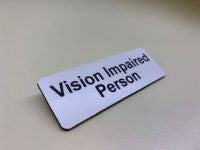 Badge (Pin) Vision Impaired Person Black on White