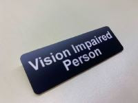 Badge (Pin) Vision Impaired Person White on Black